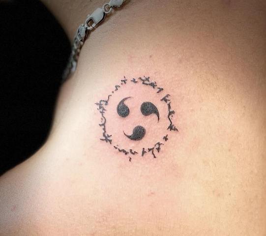 10.-Lovely-Mini-Curse-Mark-Tattoo-Design 