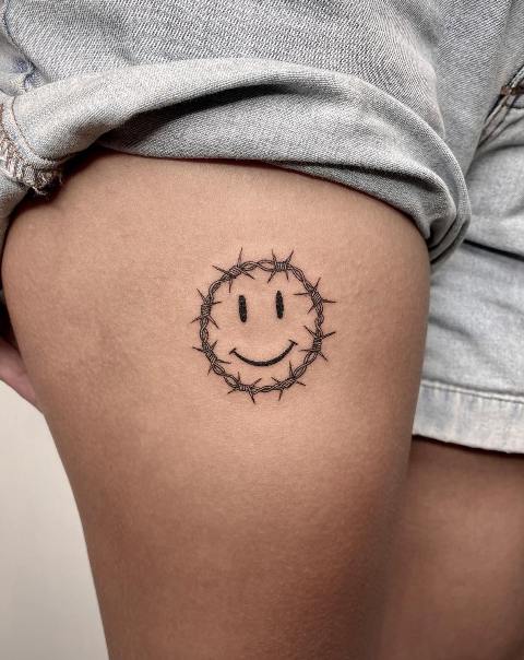 Wonderful-Smile-Face-Barbed-Wire-Tattoo
