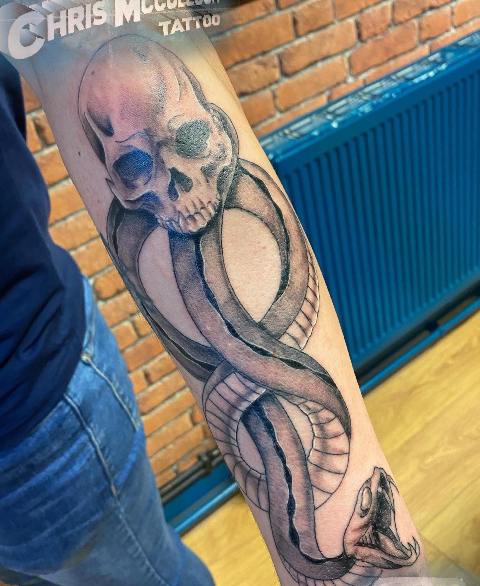 Attractive-Blackwork-Death-Eater-Tattoo 