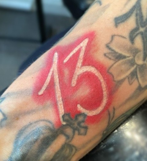 Stunning-White-&-Red-Ink-Lucky-13-Arm-Tattoo 
