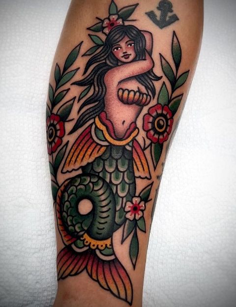 Stunning-Traditional-Art-Mermaid-Tattoo 