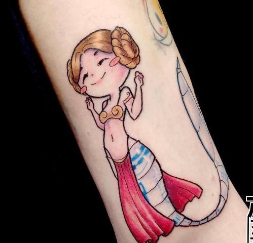 Amazing-Cute-Cartoon-Mermaid-Tattoo 