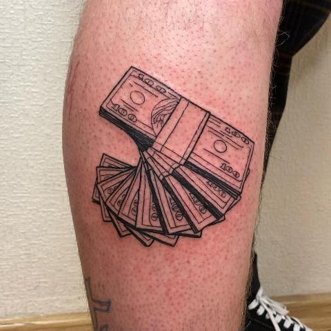 Amazing-Money-Tattoo-On-Calf 