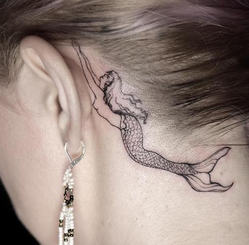 Gorgeous-Black-Ink-Mermaid-Tattoo-Behind-the-Ear 