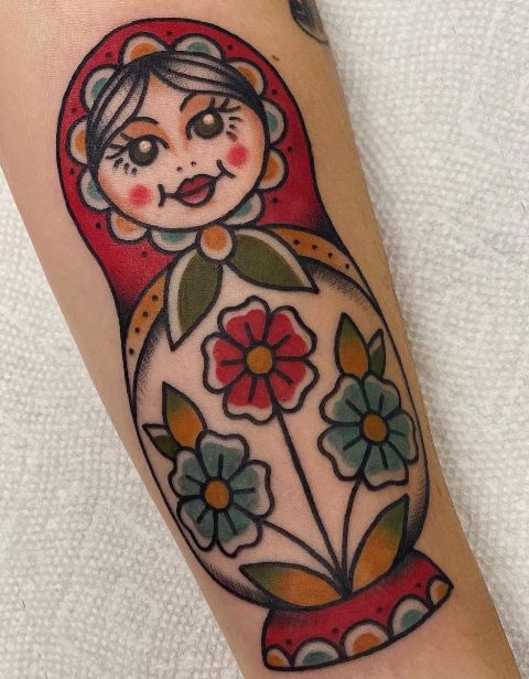 Stunning-Matryoshka-Tattoo-with-Flowers
