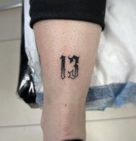 Fabulous-Black-and-White-Lucky-13-Tattoo 