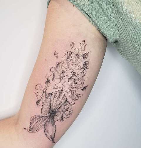 Fabulous-Detailed-Floral-Mermaid-Tattoo 