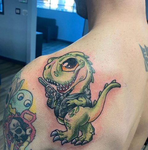 Fabulous-Dinosaur-Shoulder-Tattoo 