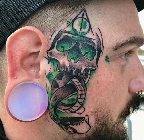 Gorgeous-Death-Eater-Tattoo-on-Face 