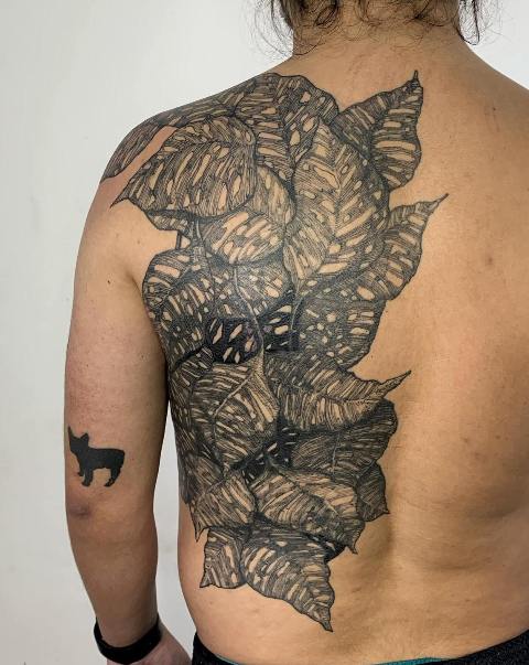 Gorgeous-Giant-Leaves-Tattoo-on-Back 