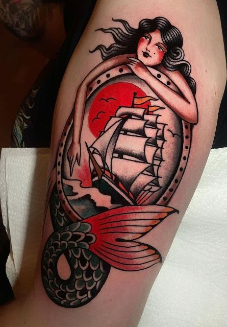 Wonderful-Mermaid-&-Ship-Arm-Tattoo 