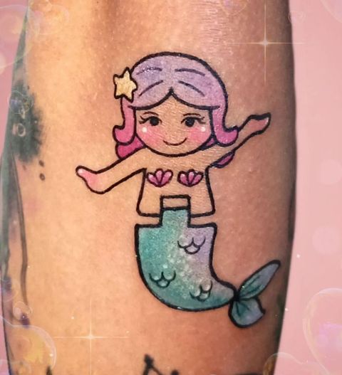 Fabulous-Adorable-Minimalist-Mermaid-Tattoo 