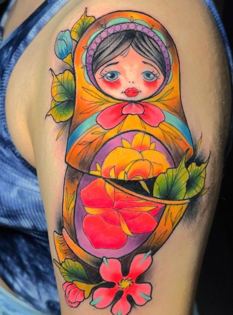 Gorgeous-Matryoshka-Tattoo-with-a-Sunflower
