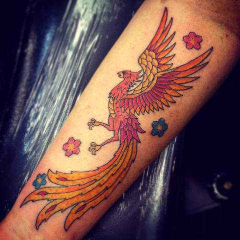 Great-Cute-Phoenix-On-Arm-Tattoo 